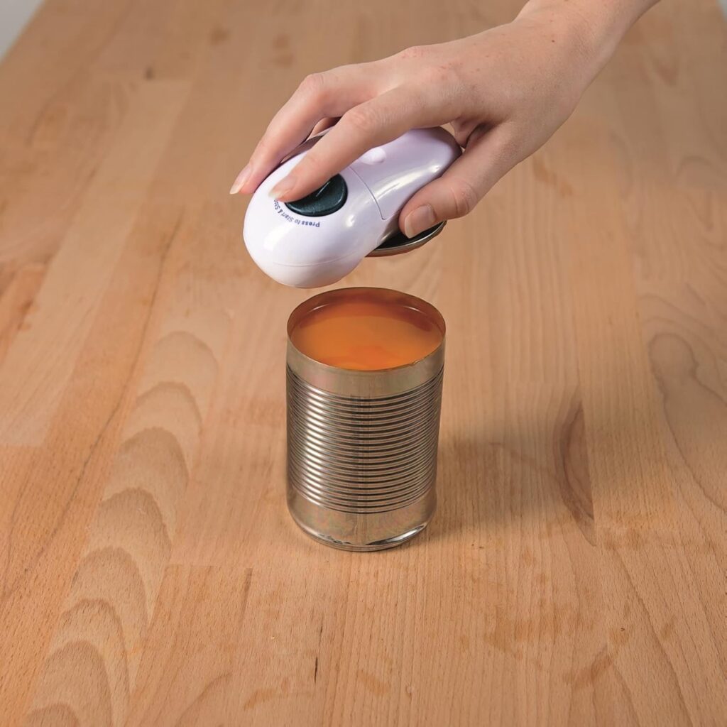 One touch can opener in white with opened tin